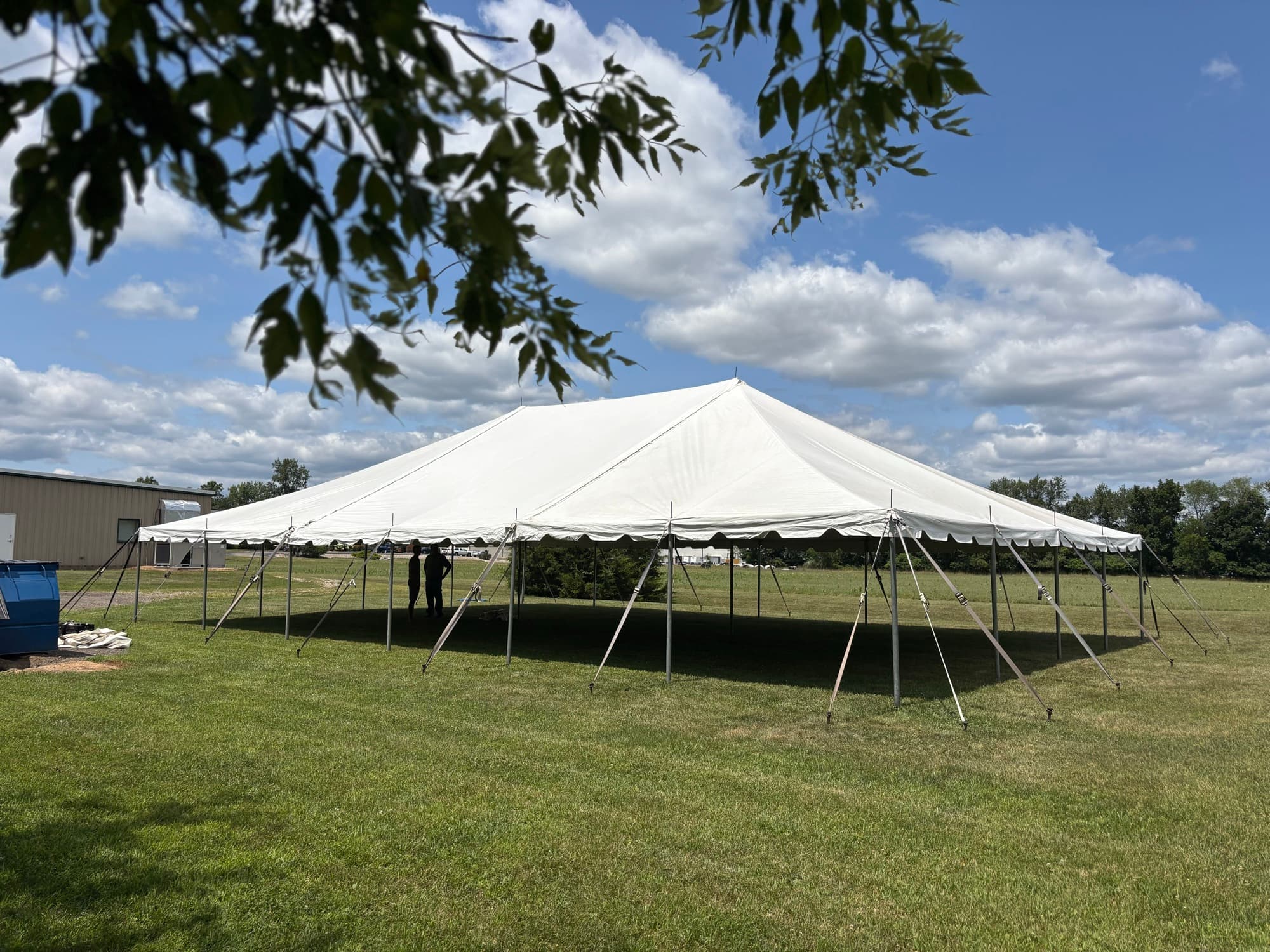 40x60 Pole Tent set up on a lawn in Jackson, MI