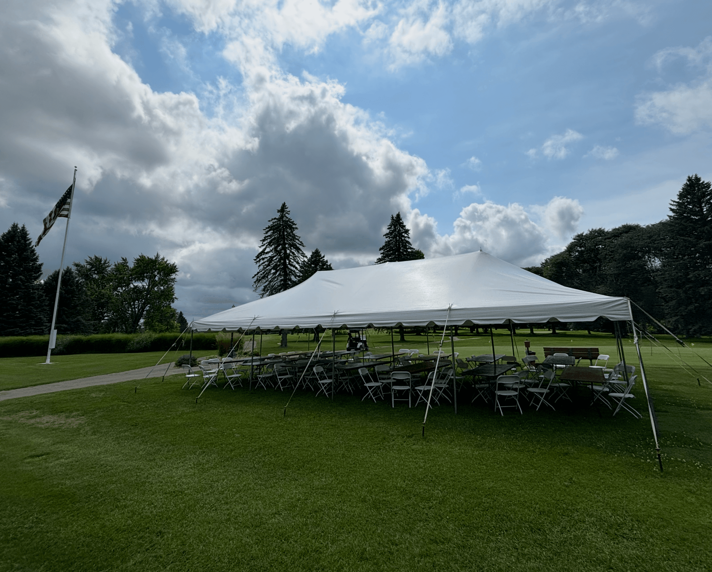 20x40 Pole Tent set up on a lawn in Jackson, MI